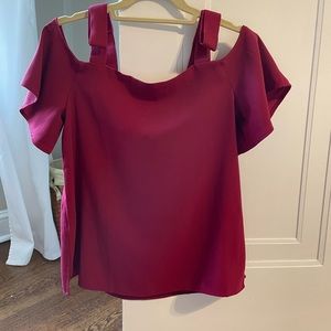 Raspberry colored top.